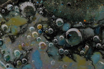 Acrylic color in water and oil. Macro Abstract texture background.