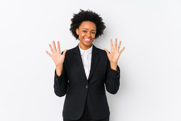 Middle aged african american business  woman against a white background isolated showing number ten with hands.