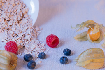 Hercules with berries scattered on the table