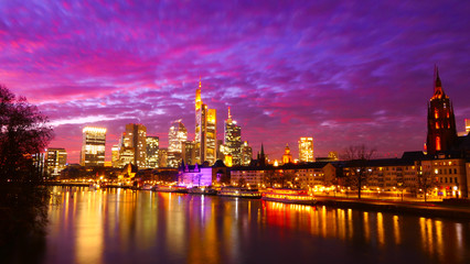 Fototapeta na wymiar A amazing view at night over the City of Frankfurt am Main, across the Main river to the Skyline in Germany