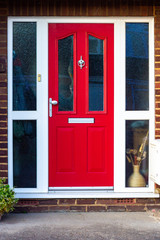 Vibrant and dynamic red wooden front door
