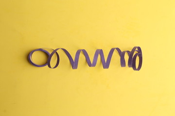 party streamers on colorful background