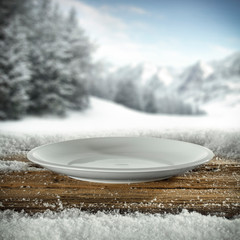desk of free space cover of snow and landscape of mountains. 