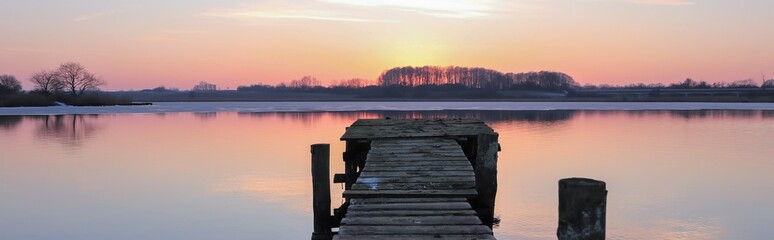 peaceful lake scene in winter, grief, obituary