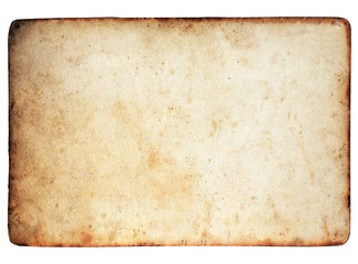 Old yellowed parchment paper with burnt edges .Texture or background