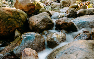 Long exposure of creek running in the California mountains