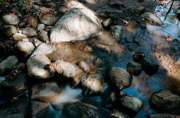 Long exposure of creek running in the California mountains