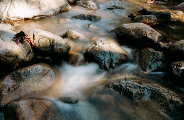 Long exposure of creek running in the California mountains