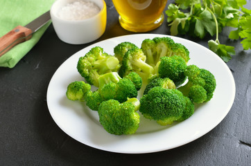 Vegetarian food. Broccoli on white plate