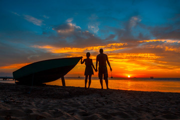 A couple in love at Roatan Sunset from West End. Honduras