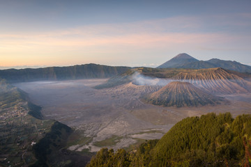 A beautiful scene of Mount Bromo at sunrise or sunset taken from best view point, Penanjakan. Mount Bromo is an active volcano and one of the most visited tourist attractions in East Java, Indonesia.