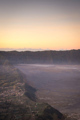A beautiful scene of Mount Bromo at sunrise or sunset taken from best view point, Penanjakan. Mount Bromo is an active volcano and one of the most visited tourist attractions in East Java, Indonesia.