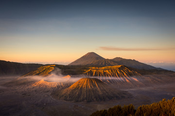 A beautiful scene of Mount Bromo at sunrise or sunset taken from best view point, Penanjakan. Mount Bromo is an active volcano and one of the most visited tourist attractions in East Java, Indonesia.