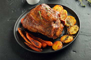 Grilled pork, fried potatoes and carrots