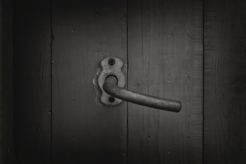old wooden door with handle