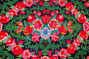 Colorful traditional vintage handmade folk carpet with floral shapes and motifs of Moldovian or...