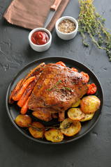 Barbecue pork, fried potatoes and carrots