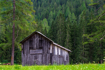 old wooden hut in the dolomites