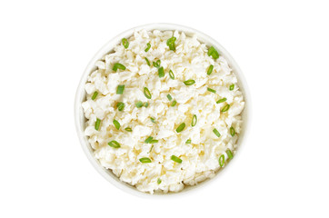 Curd cheese with green onion in white bowl