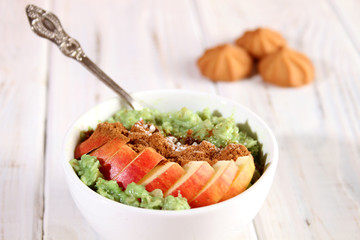 Breakfast with oatmeal and fruit.