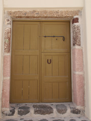 Ancient entrance doors of historic houses in Emporio, the largest village of Santorini,Greece.
