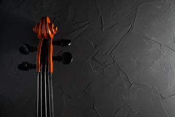 violin on a dark background with a place for inscription