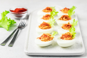 Smoked paprika deviled eggs. Selective focus, space for text.
