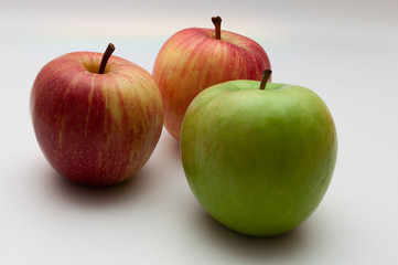 Fototapeta na wymiar three isolated apples on a white background