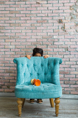 little girl playing hide and seek