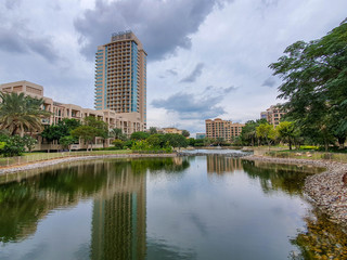 DUBAI, UAE - NOVEMBER 2019: Tecom distric with its fantastic skyscrapers, green parks and cozy cafes.