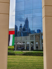 DUBAI, UAE - NOVEMBER 2019: Tecom distric with its fantastic skyscrapers, green parks and cozy cafes.