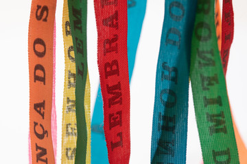 Lucky bracelets typical of Bahia, Brazil (Lembrança do Senhor do Bonfim da Bahia). Translation:...