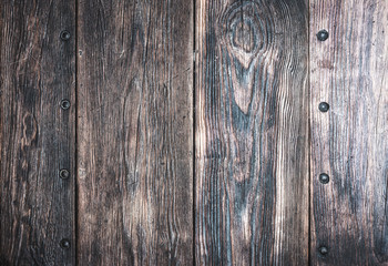 top view of dark rustic wooden table, wooden planks background