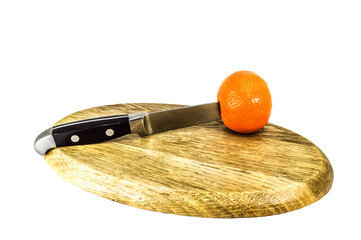 Orange mandarins on cutting board isolated on white background
