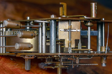 Vintage watch machine macro detail. Close up of old clock.