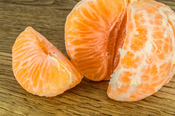 Orange mandarins,  tangerine peel or mandarin slice isolated on white background