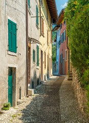 Fototapeta na wymiar Idyllic view at Cassone di Malcesine, beautiful village on Lake Garda. Veneto, Province of Verona, Italy.