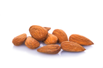 Group of almonds isolated on white background
