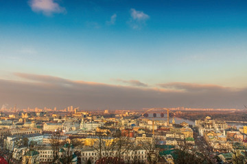Fototapeta na wymiar View from mountain of Dnieper river and the old city Kiev at sunset
