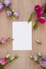 bouquet of roses and a blank card