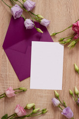 bouquet of roses and a blank card