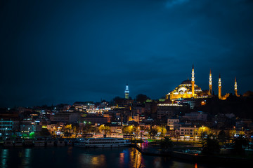 Fototapeta na wymiar Suleymaniye Mosque view from Golden Horn during twilight with amazing lights and colors