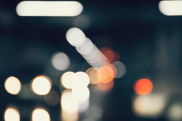 Abstract defocused background of colorful city lights at night.