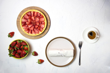 Strawberry pie on a white table