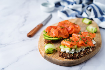 Smoked salmon ricotta cheese  rye sandwich