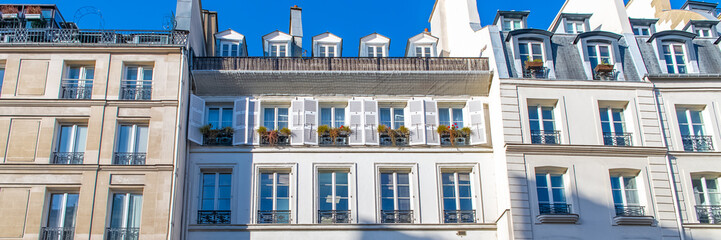Paris, typical facade and windows, beautiful building rue Reaumur