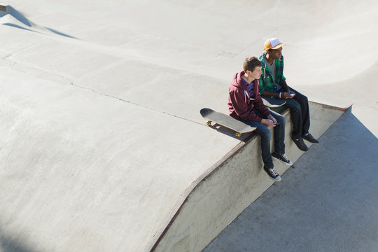 view from above of two teenage boys at skate-park