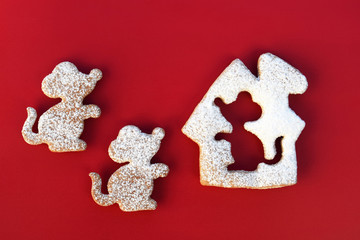 Mouse in a house - creative concept with sugared gingerbreads