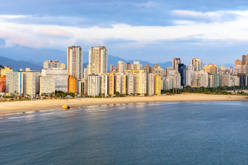 Aerial view of two Brazilian coastal cities of the Paulista coast. End of Praia do Itarare beach at...