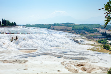 View of the unique Pamukkale natural complex with white cliffs. Pamukkale travertines without water.